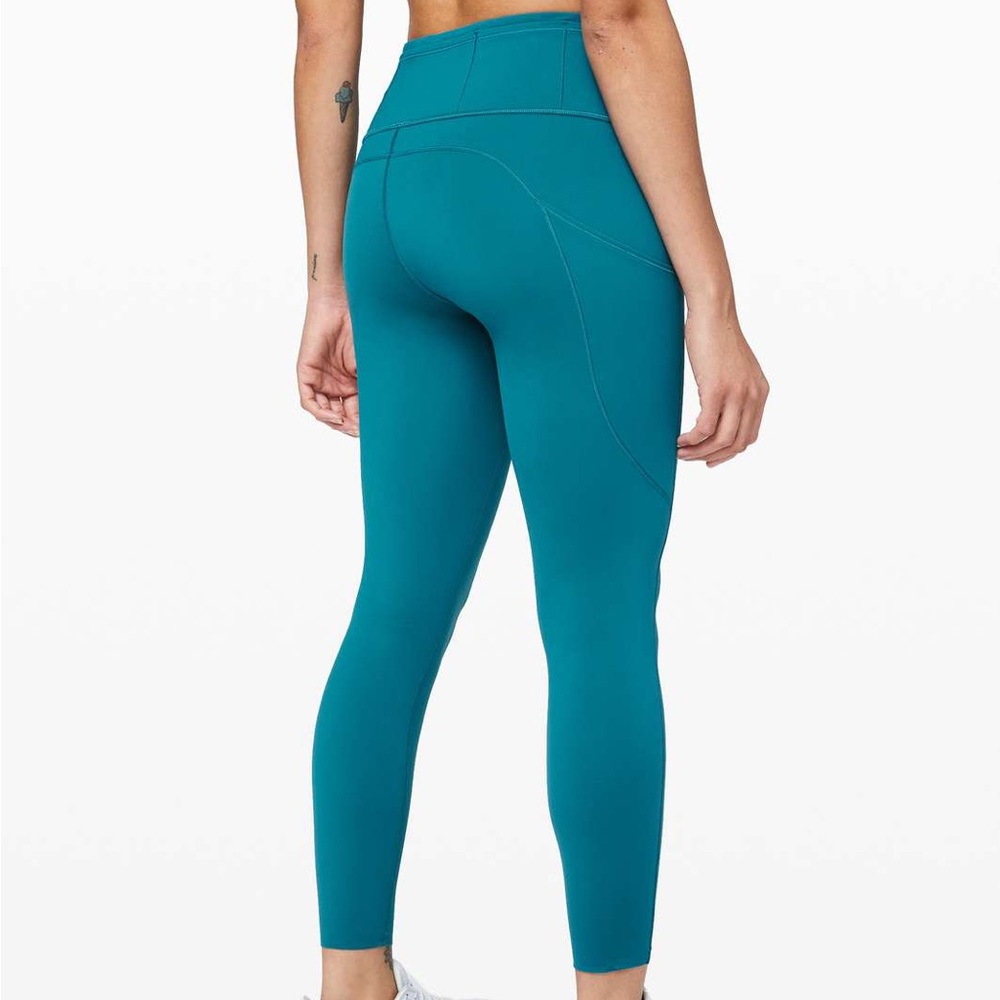Worn once. Teal Lululemon Fast and Free Tights